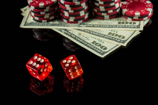 Close-up of live baccarat cards being dealt by khusus 303 dealer with betting chips visible